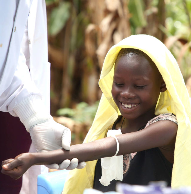 Child giving a blood sample to test for schistosomiasis in Kenya FIND/George Muiruri 2021