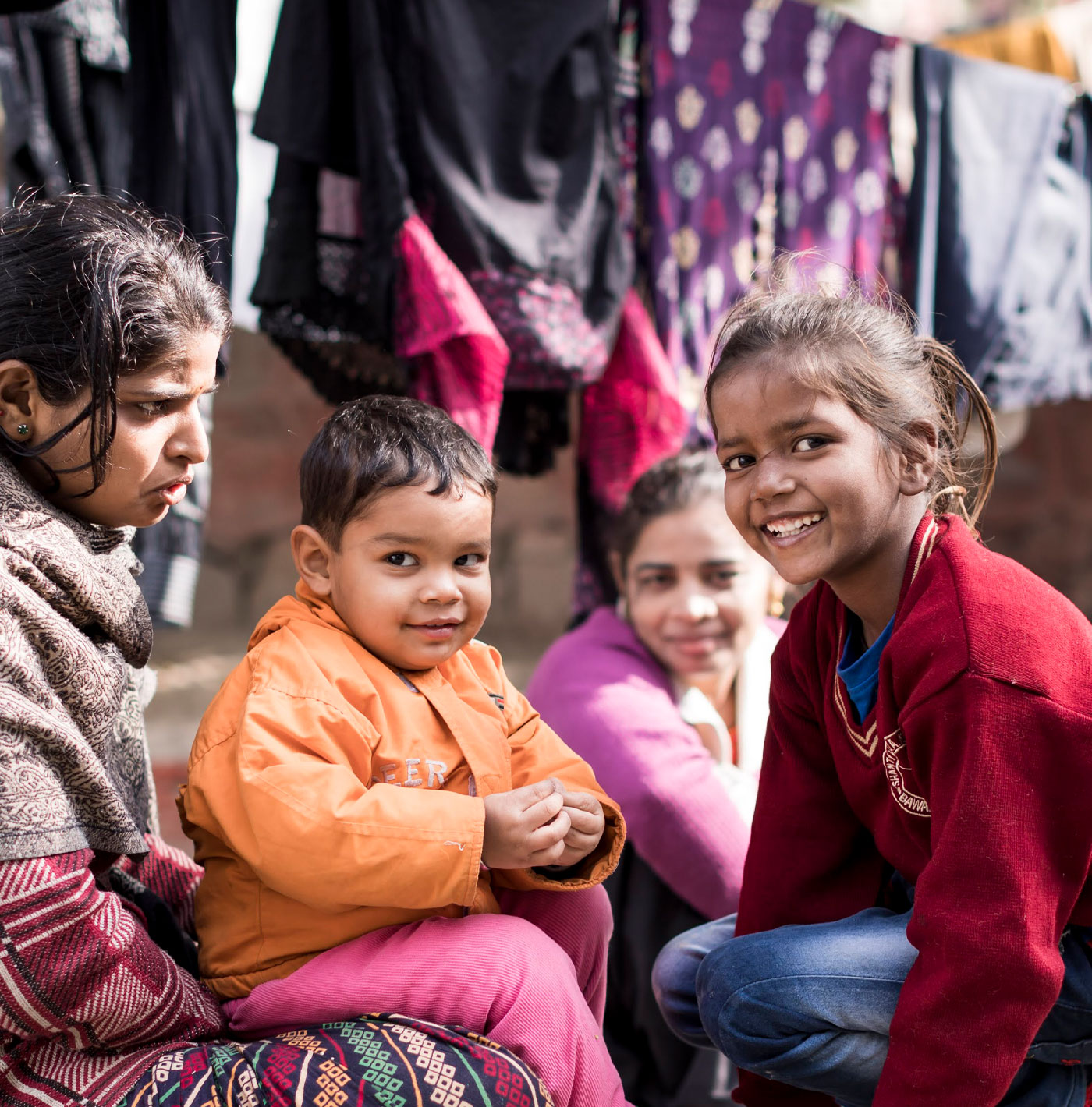 A family who live next door to a drop-in centre in Delhi where DNP+ provide advice, food and encouragement to drug addicts intent on becoming clean, New Delhi, India, 15.12.2017 © FIND/Ben Phillips