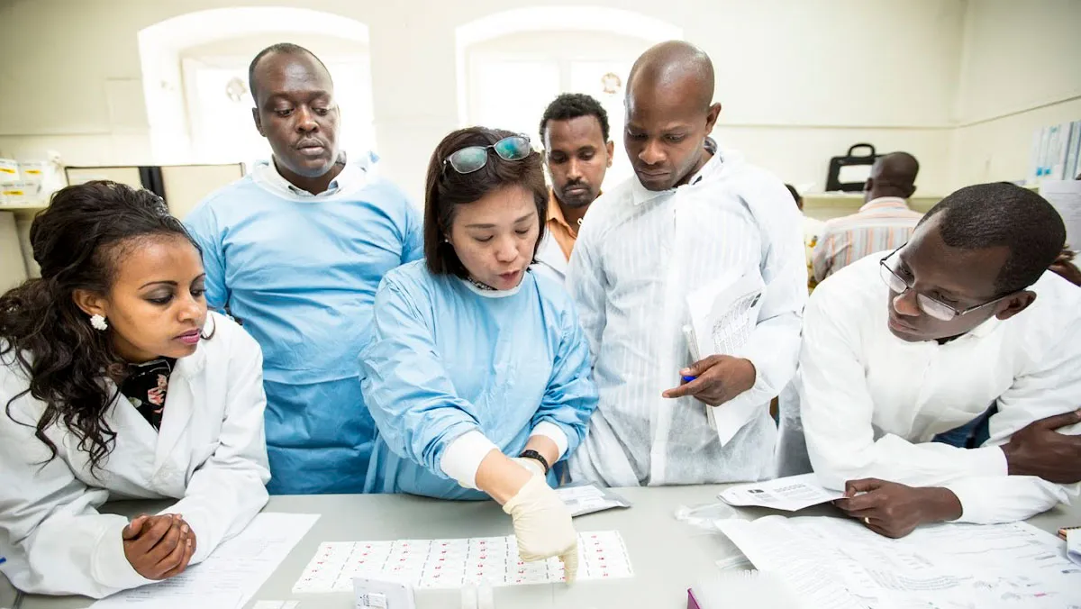Jennifer Luchavez of RITM (Philippines) gives malaria RDT lot testing demonstration during practical component of 3 day workshop in Addis Ababa, Ethiopia. October 2016.
